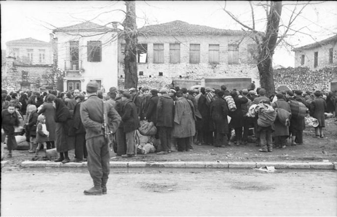 The Jewish Community was brought to the Mavili square and put onto trucks that drove into their death. (Deportation of the Jewish Community of Ioannina by the Nazis on March 25, 1944)
